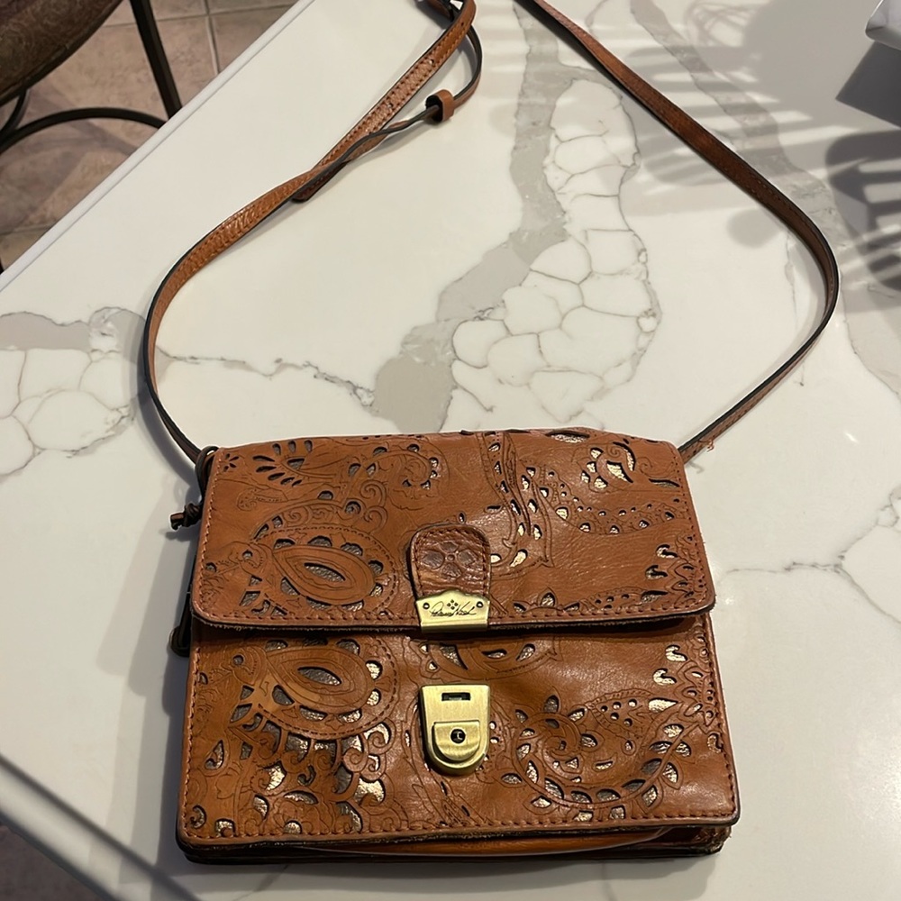 PATRICIA NASH brown Italian leather crossbody purse with adjustable strap.